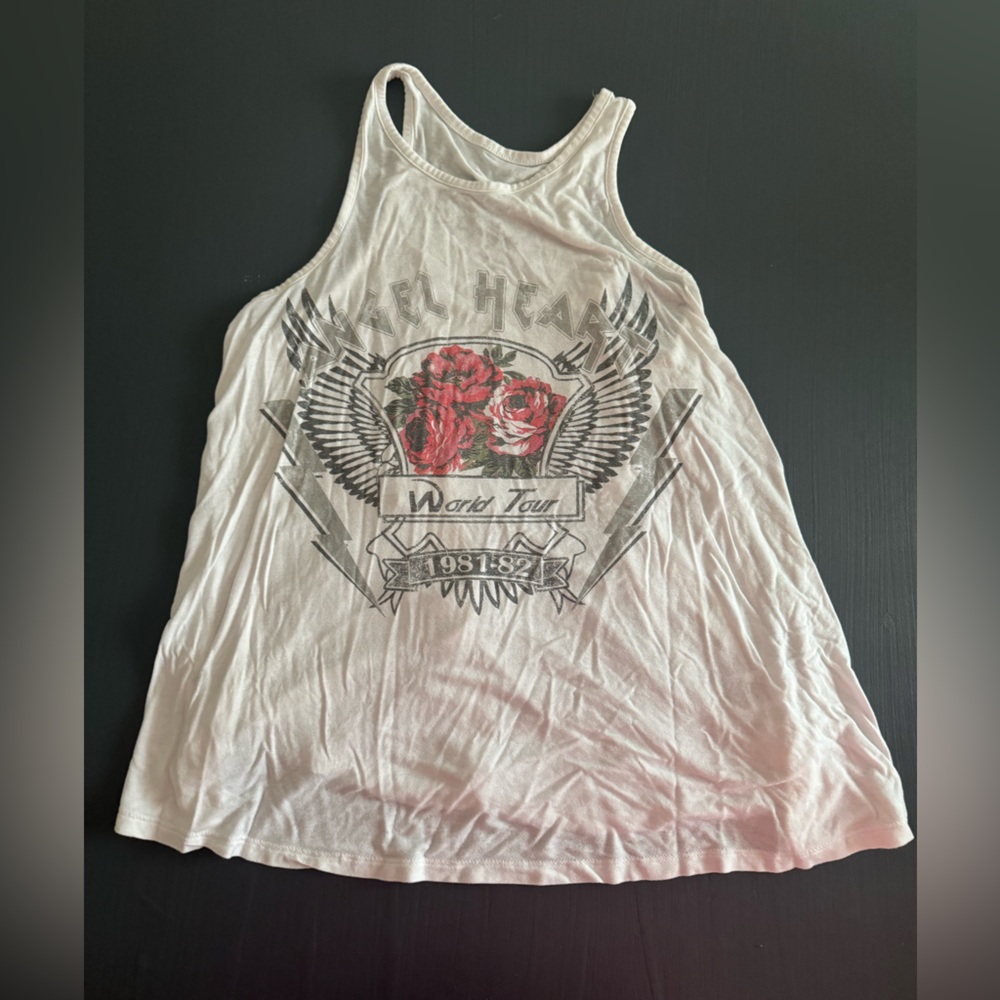Women’s size small rocker tank top fitted at top loose at the bottom